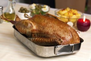 Fresh Baked Goose with potatoes,pepper,olives